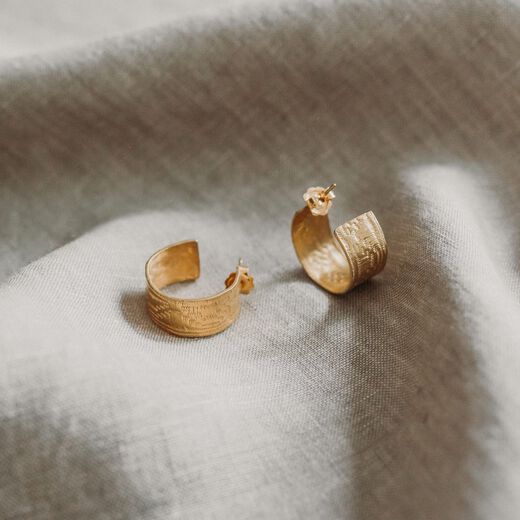 Wide ribbon hoop earrings by Emma Calvert